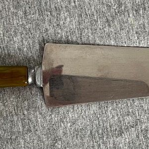 Stainless Steel Serrated Cake Server with Green Bakelite Handle